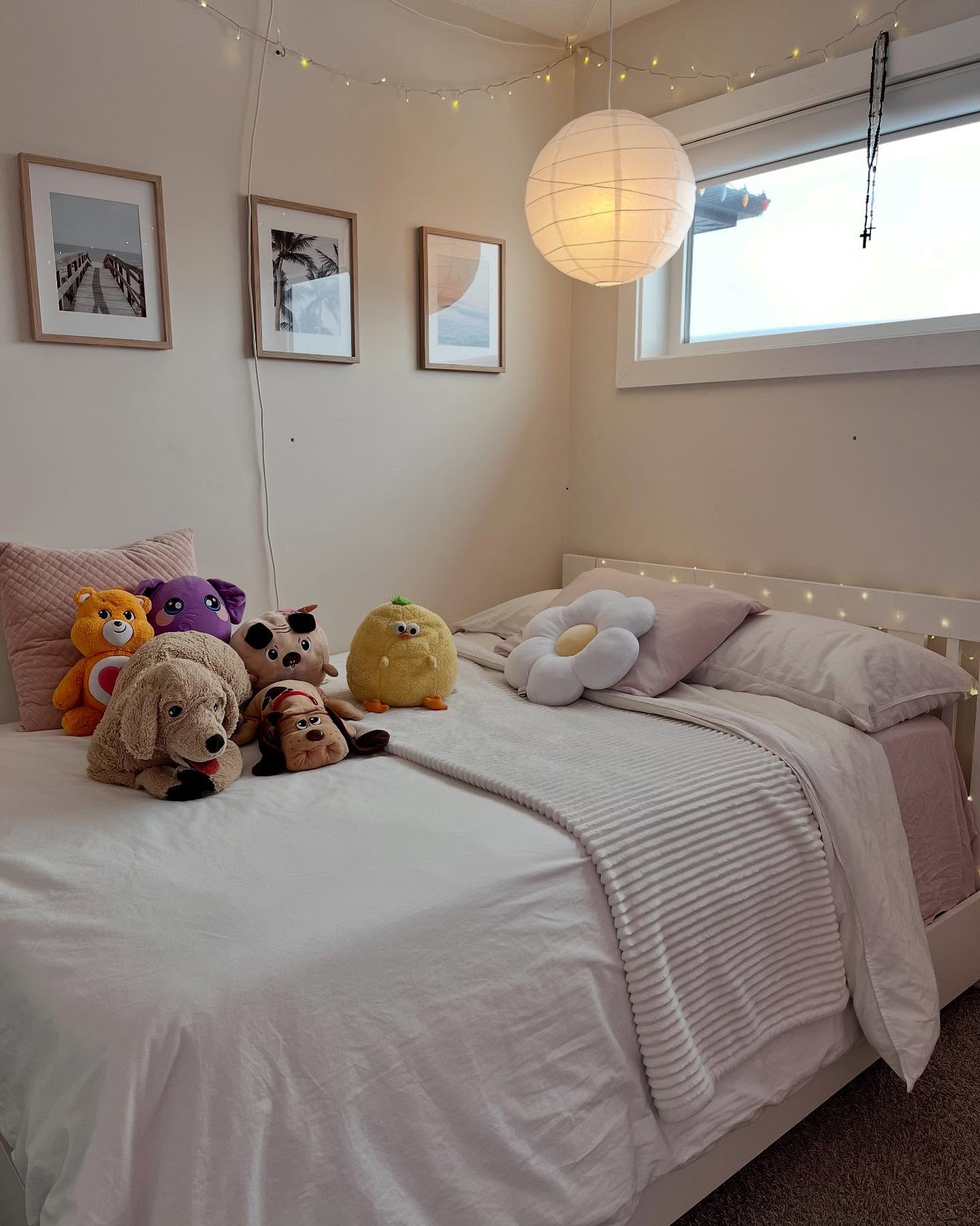 Winnipeg girls bedroom with a lighted vanity, neon sign, soft pink palette, and styled shelving